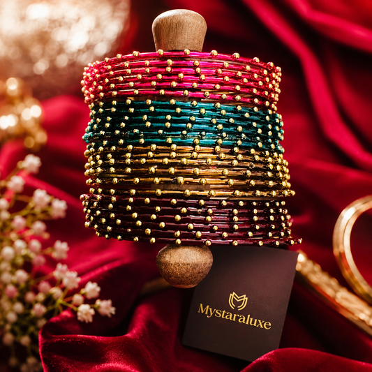 Metal bangles with gold motifs(half dozen)