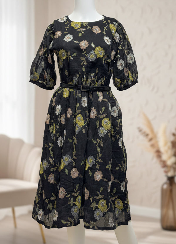 Black, knee-length frock with floral pattern