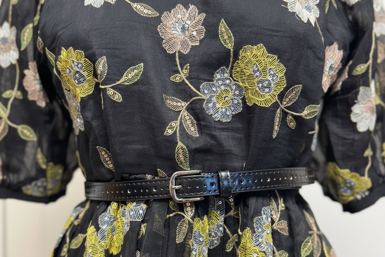 Black, knee-length frock with floral pattern