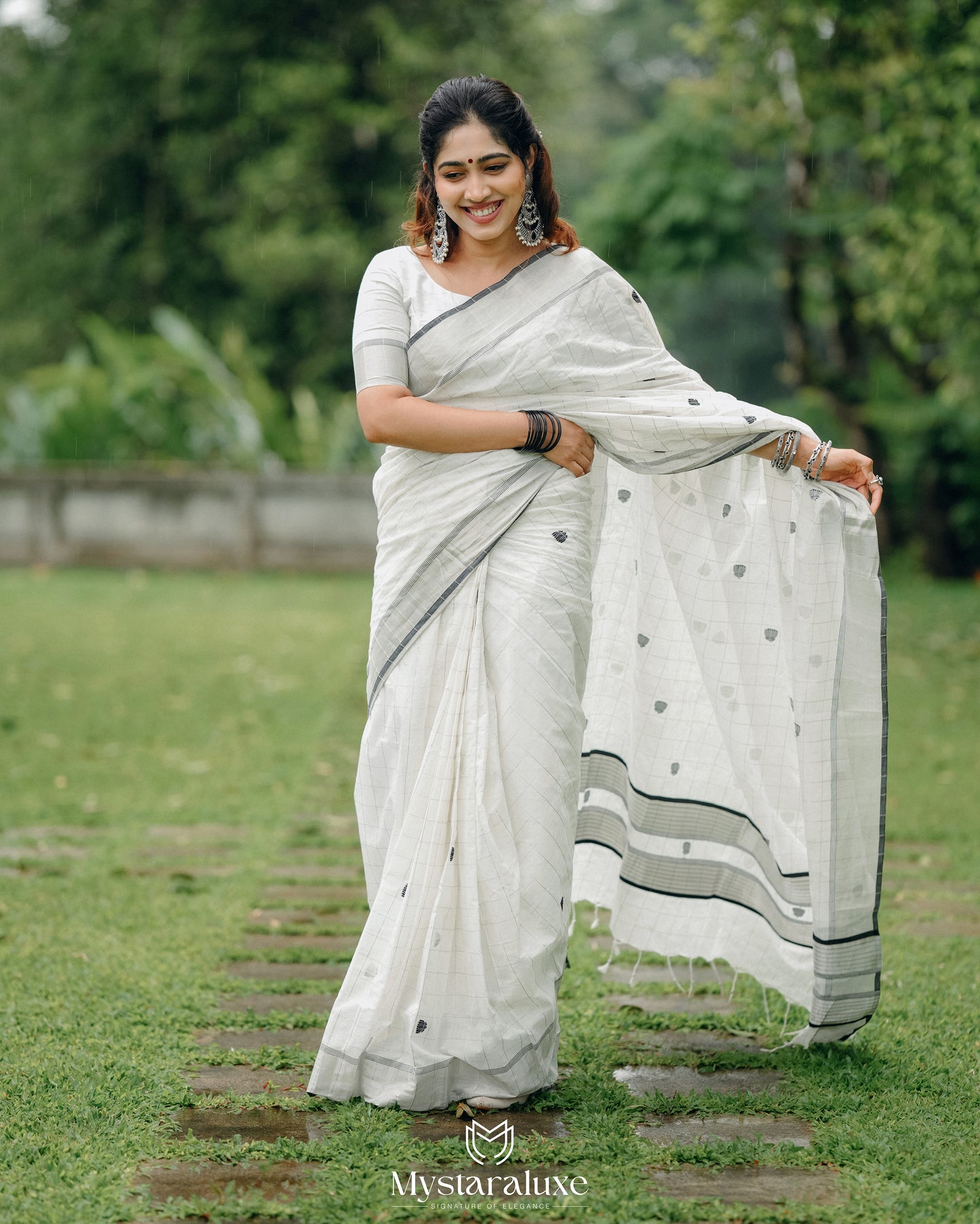Pure Handloom Saree with Silver Border and Black Lotus Motifs(Pre Order )